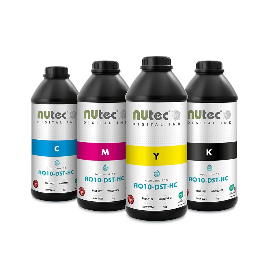 Aquamarine AQ10-DST-HC dye sublimation ink in a 1kg bottle, available in CMYK for high-density printing on transfer paper.